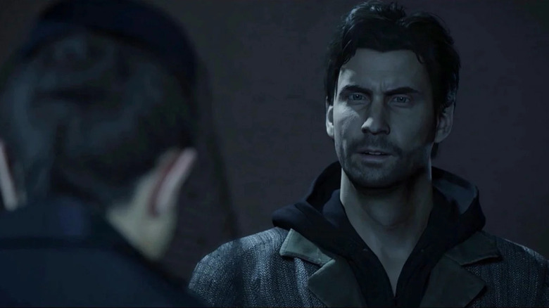 Alan Wake éjszaka beszél egy férfival 