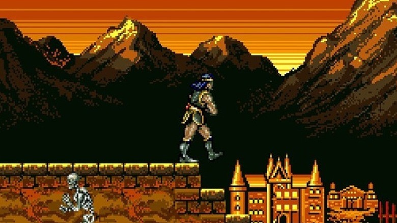 Simon Belmont egy emelvényen sétál, a háttérben a hegyekkel és egy kastéllyal a kísértetkastélyban