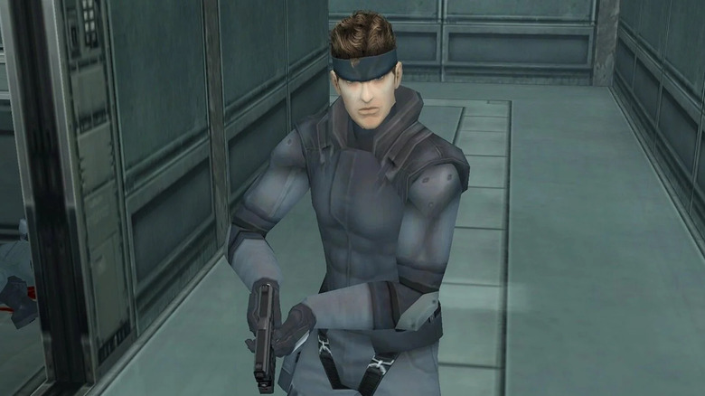 Solid Snake lopva a fegyverével a Metal Gear Solidban