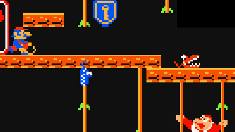 Donkey Kong Jr. felmászik a szőlőhegyekre, ahogy Claptraps közeledik, Mario pedig egy ostort tart 