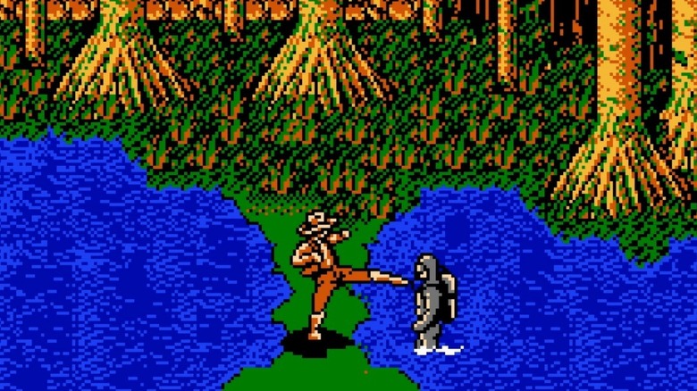 Billy West egy búvárt rúg a The Adventures of Bayou Billy című filmben
