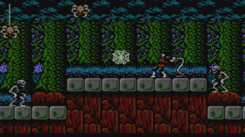 Simon Belmont egy pókhálót lendít, miközben pókok és csontvázak veszik körül a Castlevania II: Simon's Questben
