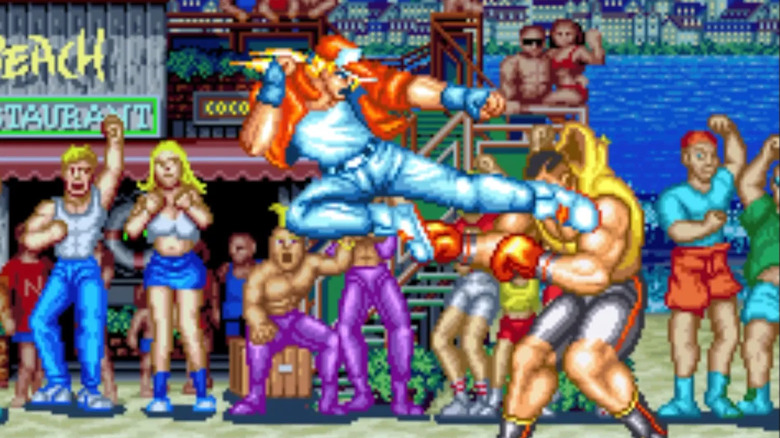 Terry Bogard egy ugrással eltalálja Michael Maxet a Fatal Fury: King of Fightersben