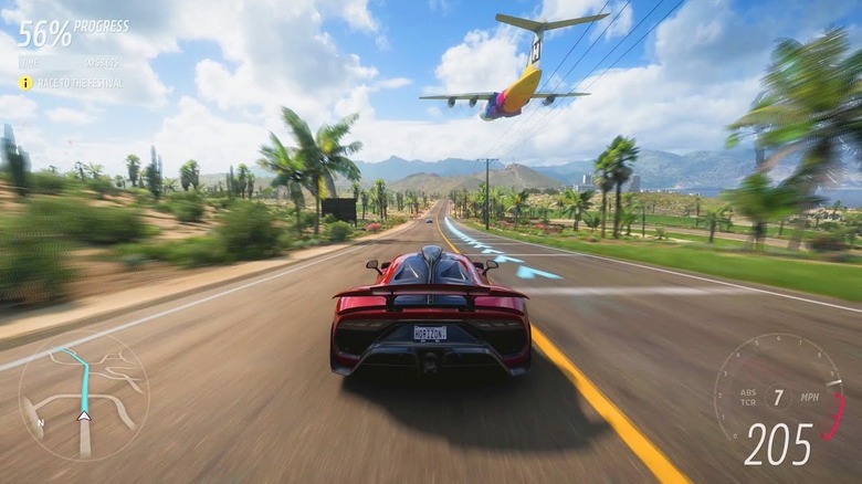 Egy repülőgép elrepül egy sportautó felett a Forza Horizon 5-ben