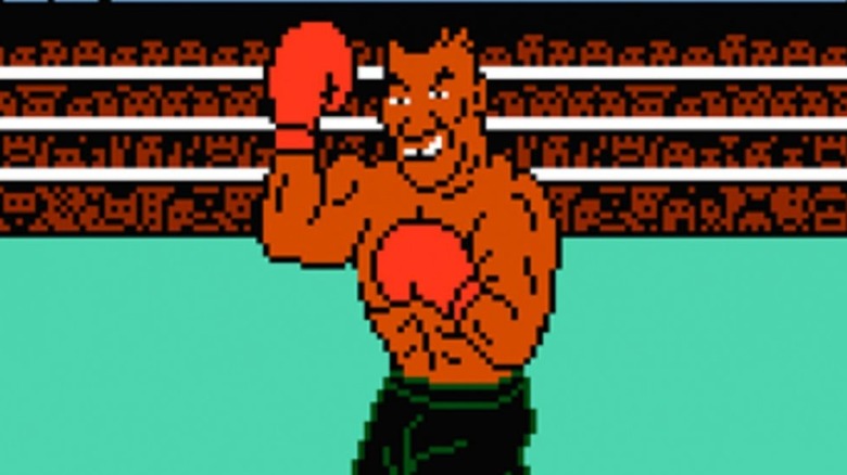 Mike Tyson diadalmasan felemeli az öklét "Mike Tyson kiütése!!" (1987)