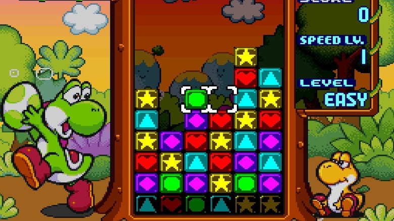 Két Yoshi színes blokkokat szervez a Tetris Attackben