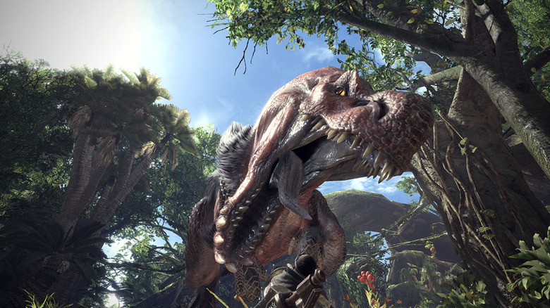 Egy hatalmas dinoszaurusz nekivág a Hunternek a Monster Hunter: Worldben