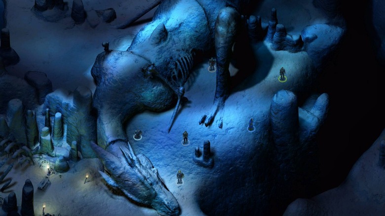 Egy csapat egy sárkány fagyott teste mellett sétál Icewind Dale-ben