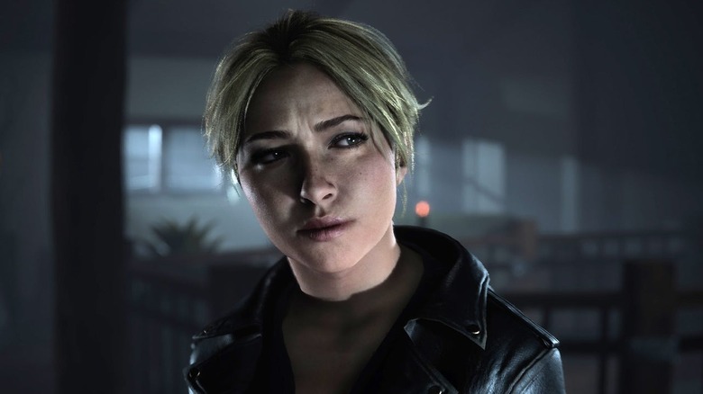 Sam Giddings az Until Dawn elsötétített előcsarnokában áll
