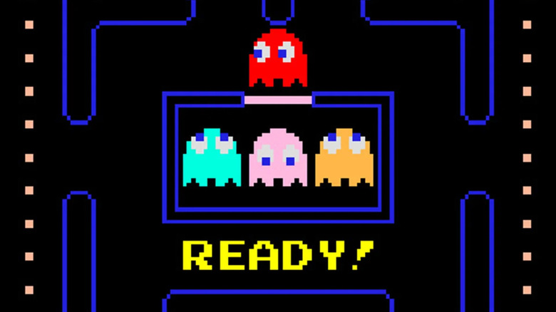 Vörös szellem bukkan elő a Pac-Man cellájából