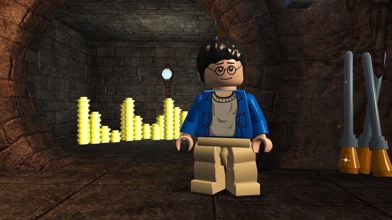 Harry Potter egy páncélszekrényben áll arannyal és seprűnyélekkel a LEGO Harry Potter: 1-4 év között