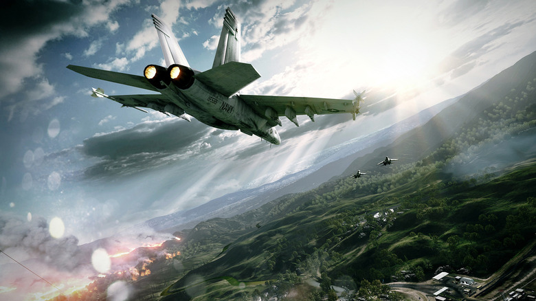 Vadászgépek szárnyalnak egy erdős táj felett a Battlefield 3-ban