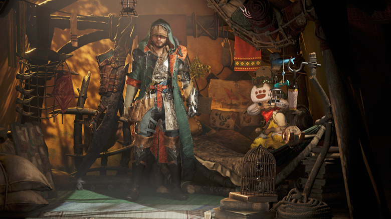 A Hunter egy sátorban áll a Monster Hunter Wildsban