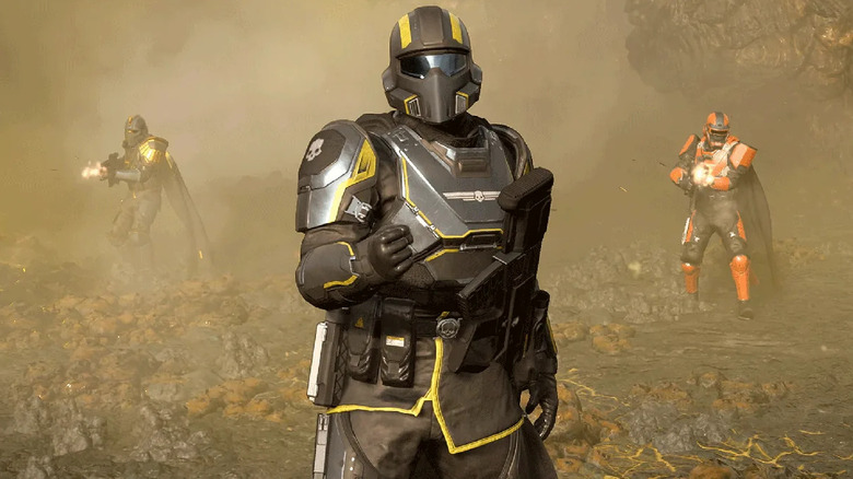 Három lökhárító áll egy ködös környezetben a Helldivers II-ben
