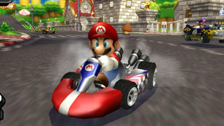 Mario a Mario Kart Wii gokartján csúszik a sarkon
