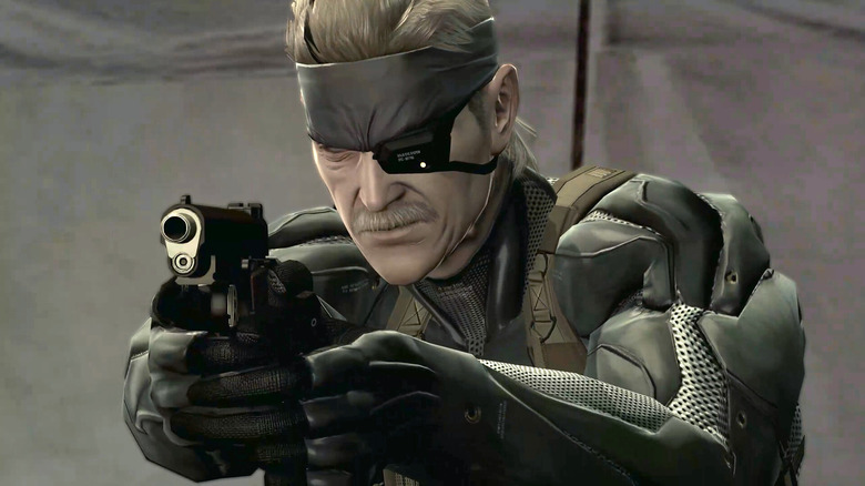 Old Snake célba veszi a pisztolyát a Metal Gear Solid 4: Guns of the Patriots játékban