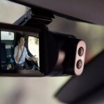 Woman discovers a hidden AI camera in her rental car recording her and warning about unsafe driving