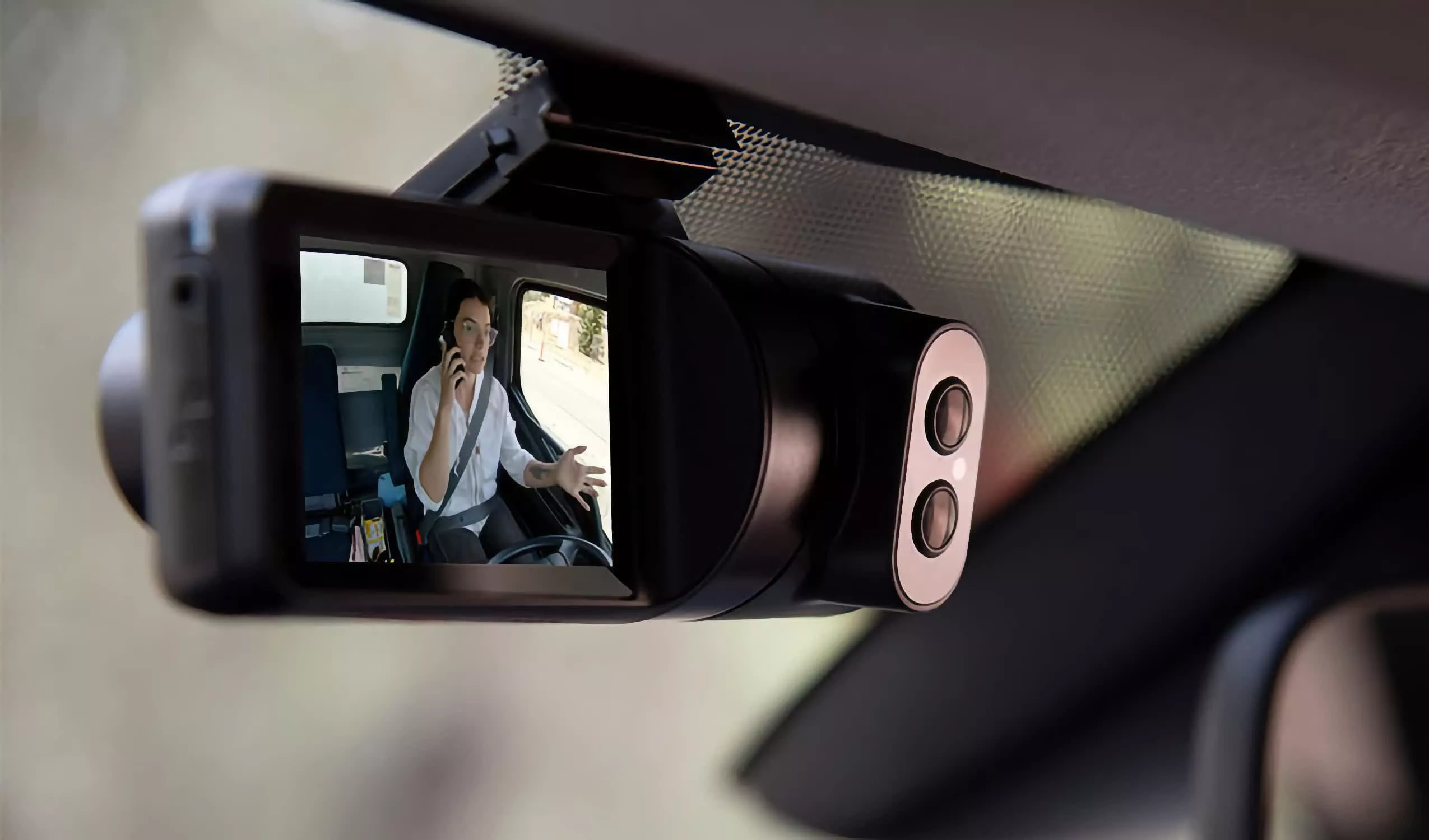 Woman discovers a hidden AI camera in her rental car recording her and warning about unsafe driving