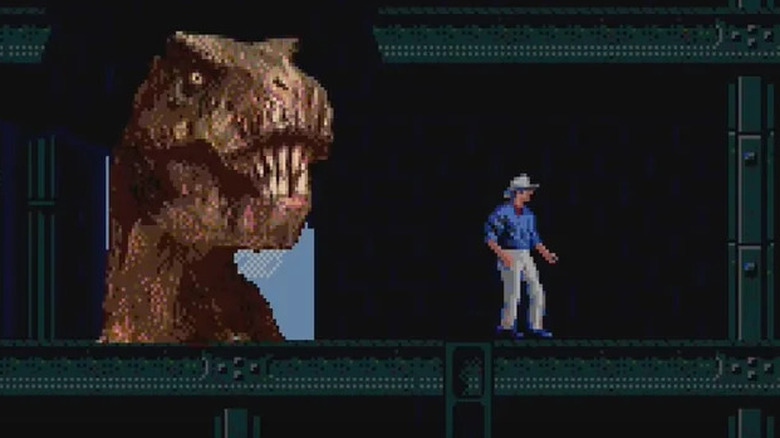 Alan Grant szemben áll egy T-Rexszel a Jurassic Parkban