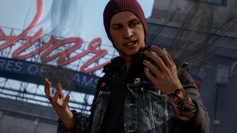 Delsin Rowe a kezét vizsgálja az Infamous Second Son-ban