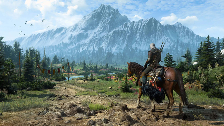 Riviai Geralt lovon ül egy hegyvonulat mellett a The Witcher 3: Wild Huntban