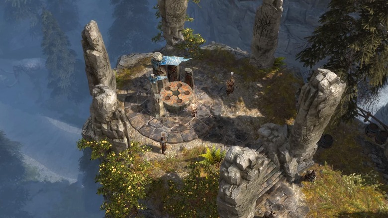 A játékos karakterek egy rituális helyszínhez közelednek egy sziklán a Grim Dawnban