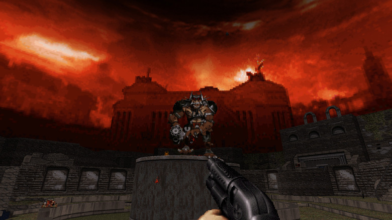 Duke Nukem egy vadászpuskával megcéloz egy páncélozott szörnyet a Duke Nukem 3D-ben