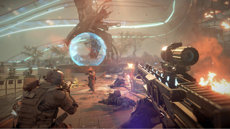 Egy csapat katona előrenyomul egy ellenségre a Killzone Shadow Fall futurisztikus városban