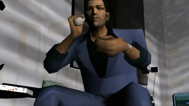 Tommy Vercetti előredől a székében a Grand Theft Auto Vice Cityben
