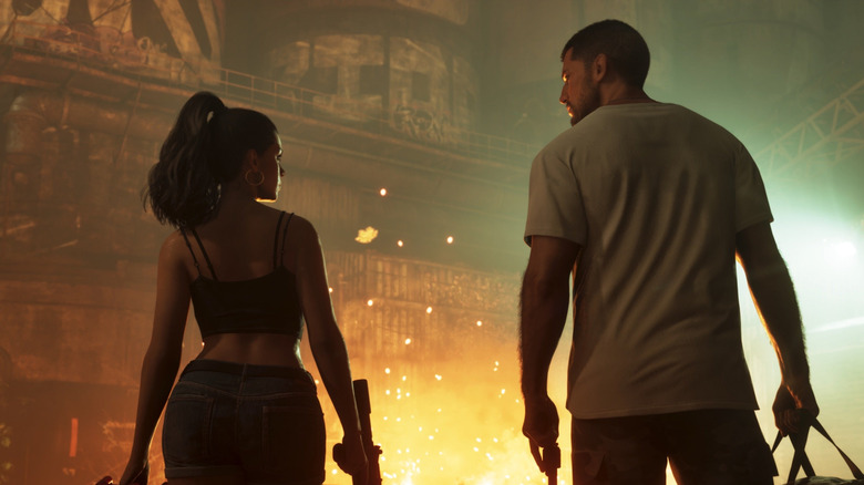 Jason és Lucia egy autót néznek a Grand Theft Auto VI-ban
