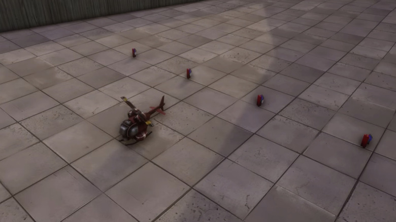 A Grand Theft Auto Vice Cityben egy távirányítós helikopter négy bomba mellett fekszik a földön