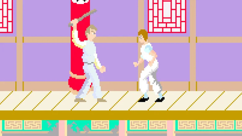Thomas közeledik egy férfihoz, aki a Kung-Fu Masterben egy ütőt lendít