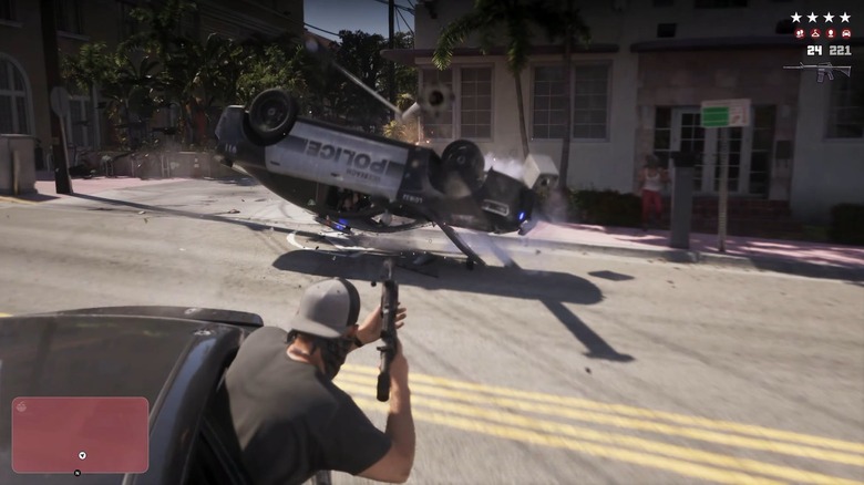 Jason egy rendőrautóra lő a Grand Theft Auto VI-ban