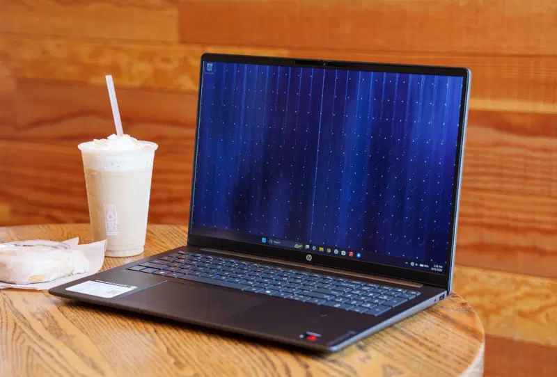 HP OmniBook 3 16 laptop open on a desk showing its keyboard and display