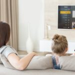 Plex app interface displayed on a smart TV screen in a living room