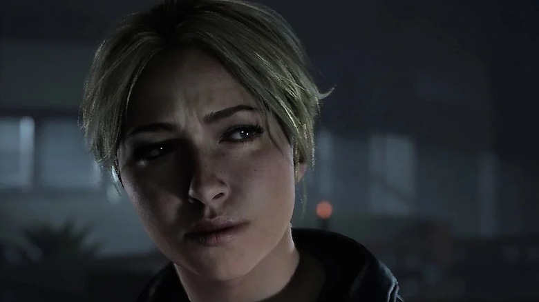 Sam Giddings gyanakodva néz valamit az Until Dawn című filmben