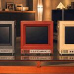 Unico Traveller ULW10 retro gaming monitor shown from the side with its rear storage compartment open