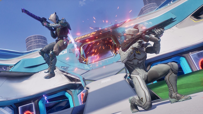 Két tűz alatt álló játékos futurisztikus fegyvereket céloz meg a Splitgate: Arena Reloaded játékban