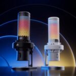 Corsair VOXARA microphone with RGB lighting sitting on a desktop boom arm