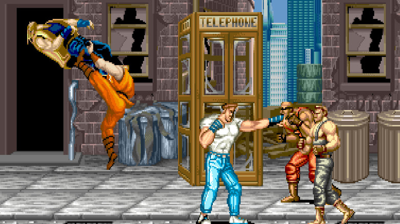 Guy megrúgja az ellenséget, míg Cody megüt két bejövő goont a Final Fightban