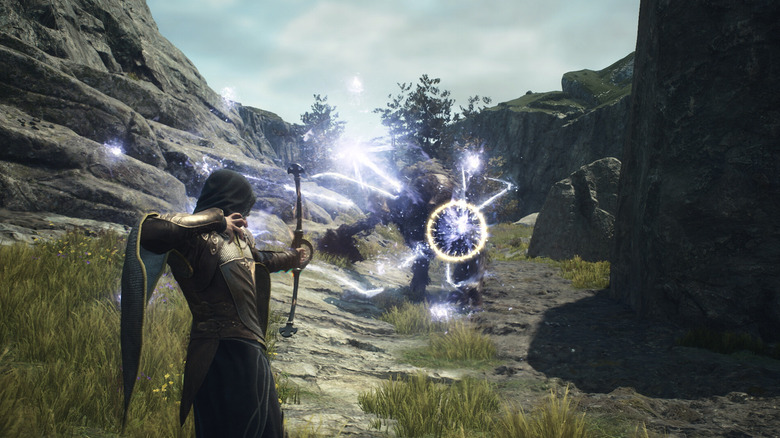 A Dragon's Dogma 2 karaktere mágikus nyíllal lövi az ellenséget