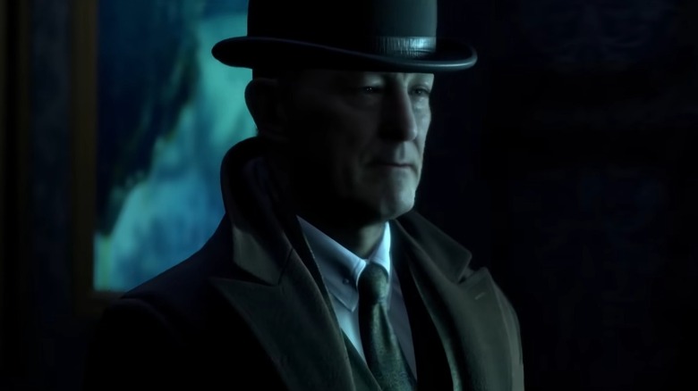 A kurátor, ahogy az a The Dark Pictures Antológiában látható. Jegyezd meg az elegáns kalapot!