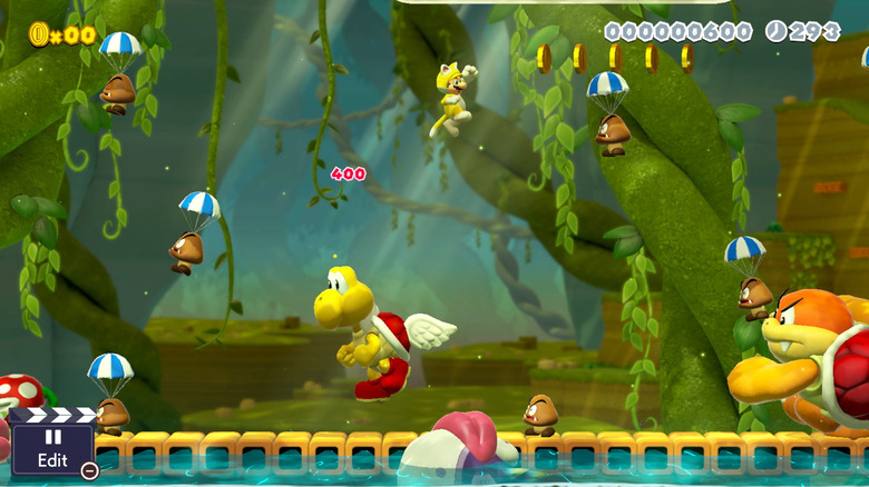 Cat Mario átugrik az ellenségek hullámain a Super Mario Maker 2-ben