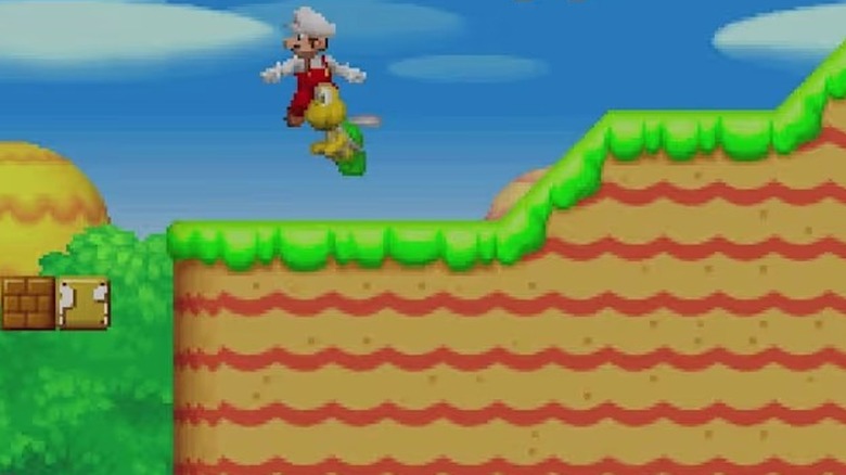 Fire Mario egy ejtőernyőre ugrik a New Super Mario Bros.