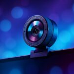 Razer Kiyo V2 Pro webcam mounted on a monitor showing its wide-angle lens and privacy shutter