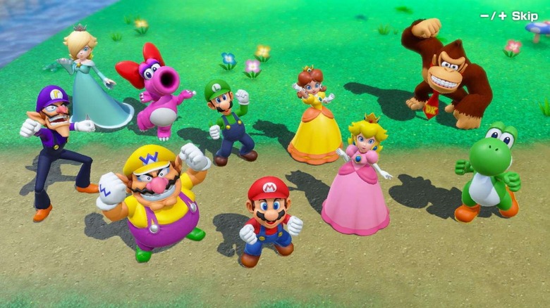 Mario és barátai diadalmasan pózolnak egy folyó mellett a Mario Party Superstarsban