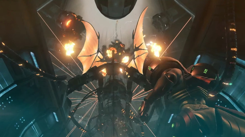Samus felnéz egy felrobbanó Ridley-re a Metroid Prime Remasteredben (2023)