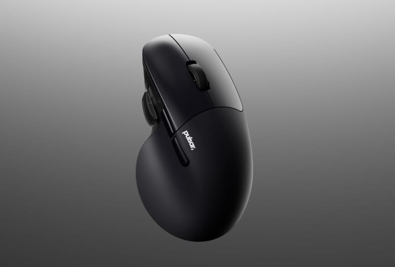 Pulsar X5 gaming mouse shown at Tokyo Game Show with its ergonomic shell and thumb button