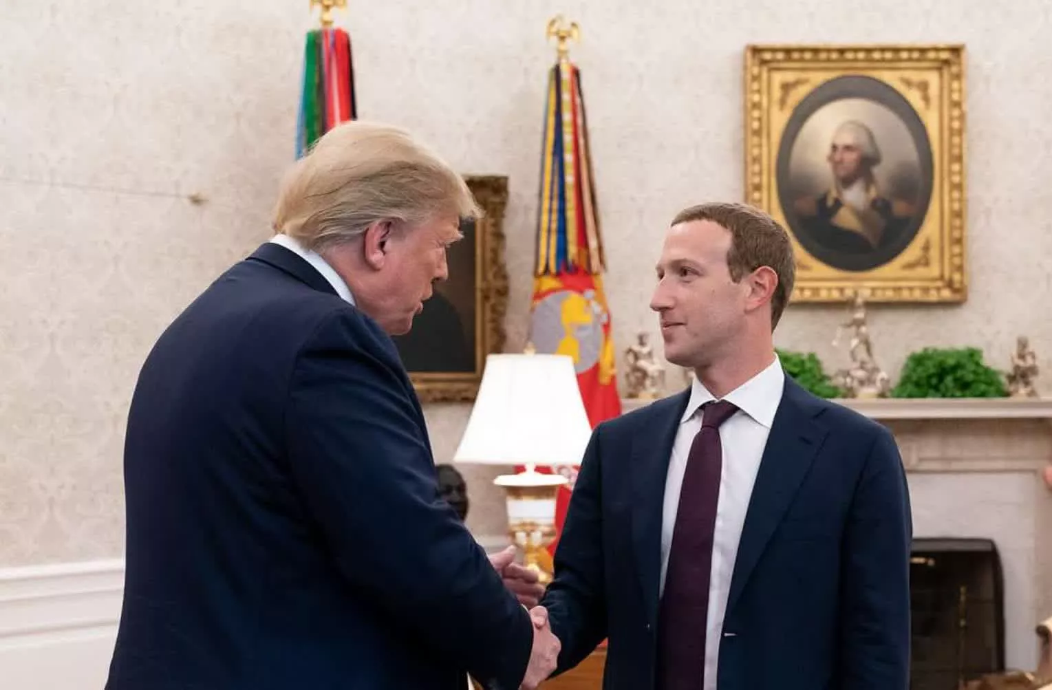 Trump unveils voluntary AI safety pact, backs more data centers, and officially renames AI