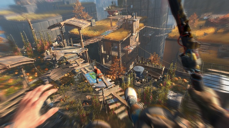 A Dying Light 2 játékos felülről ugrál egy ellenségre